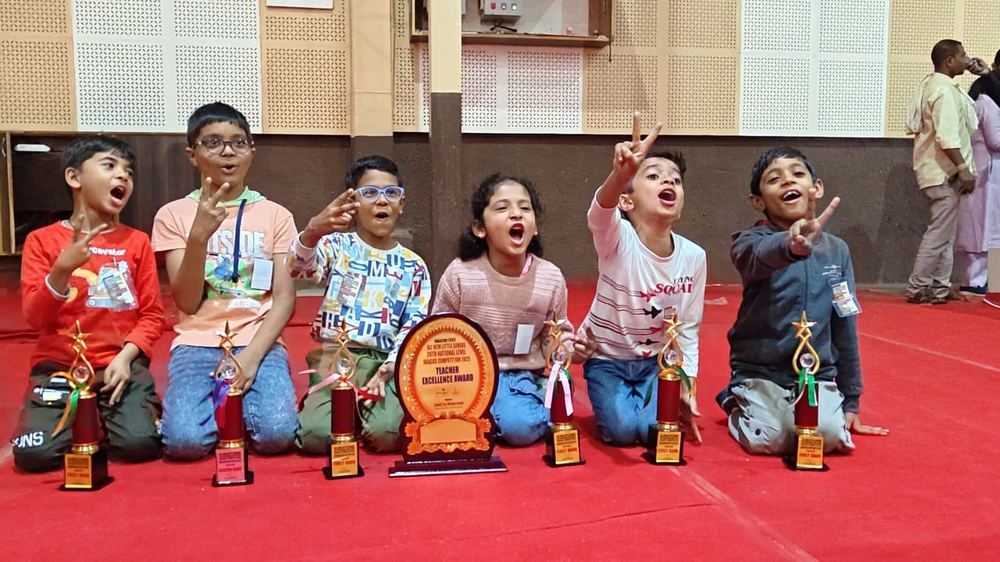 Students celebrating first rank wins at national Abacus competition, Smart Kids Study Circle Manish Nagar Nagpur
