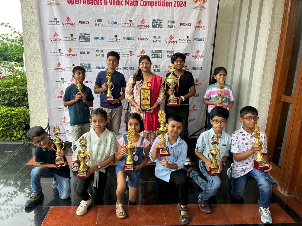 Abacus classroom Manish Nagar Nagpur — students with trophies at National Level competition